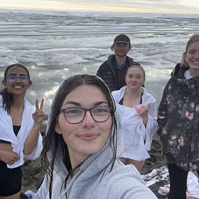 ITEX, UTEP and NEON crew members on the shore of the Arctic ocean after a quick plunge
